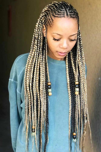 Fulani Braids with a Neat Centre Part and Beaded Ends Fulani braids hairstyle