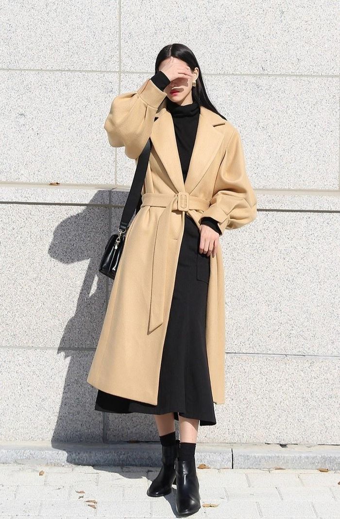 Beige Wool Coat Over a Black Turtleneck and Long Skirt winter formal outfit