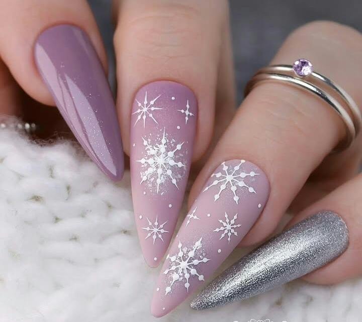 Pastel Lilac Starburst Snowflake Stiletto Nails snowflake nail art design