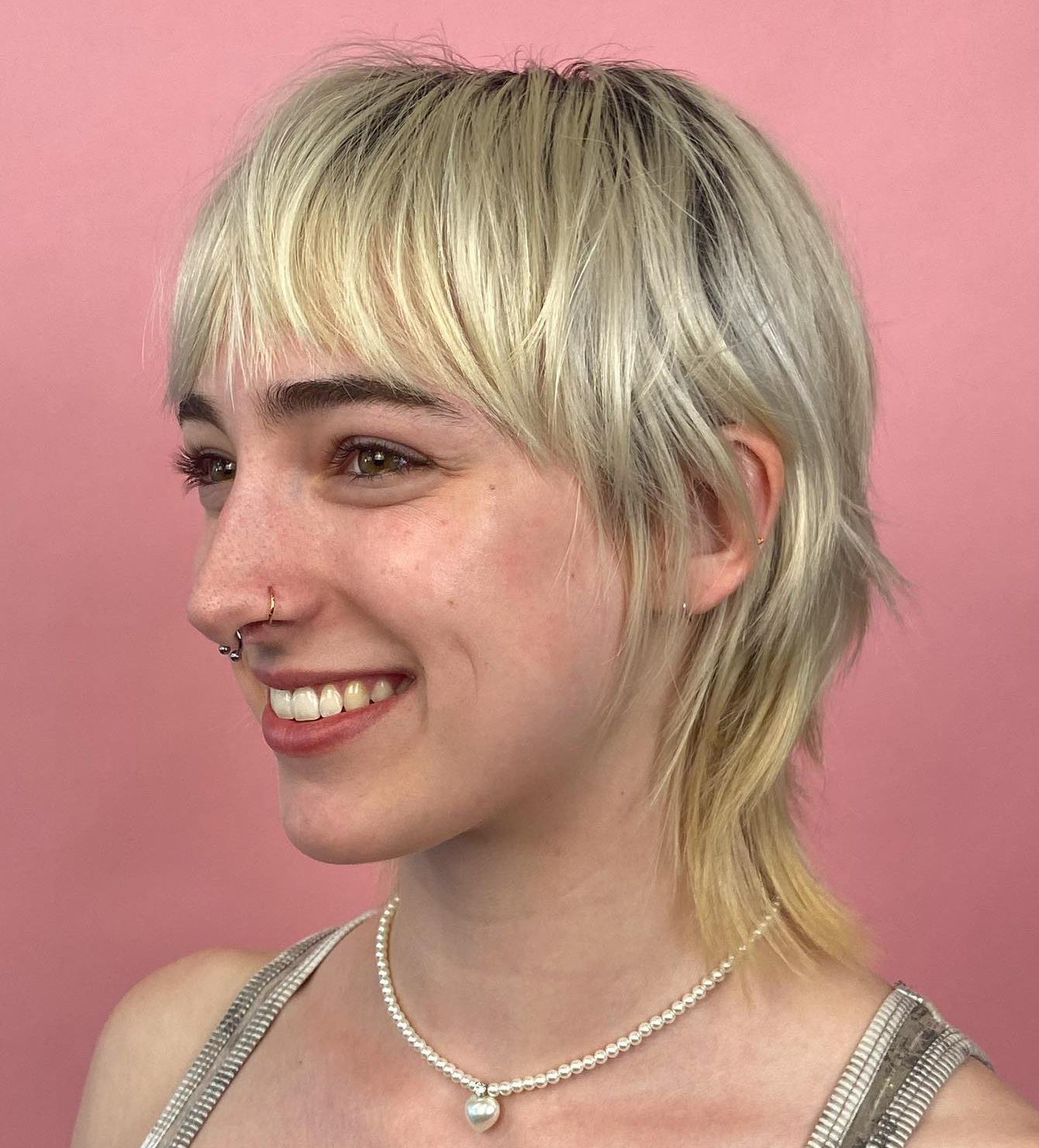 Platinum blonde shaggy wolf cut for thin hair