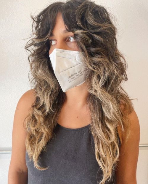 Feathered shag for soft wavy hair layered haircut