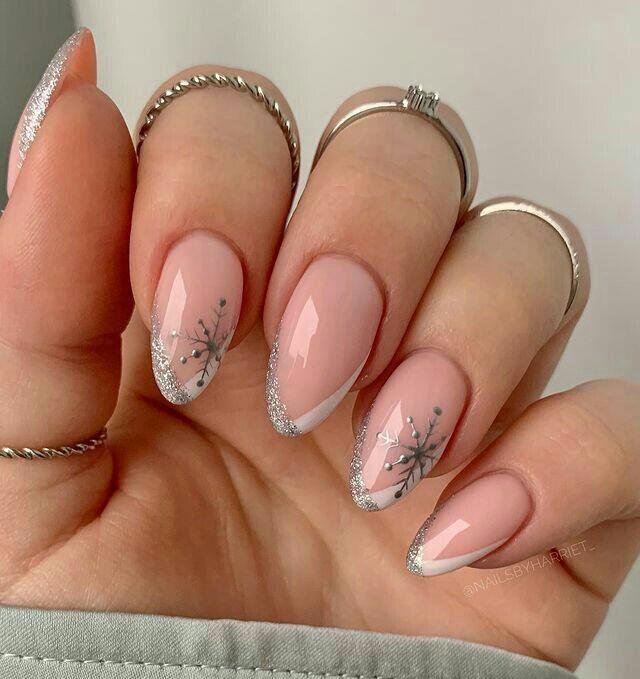 Silver-Edged Snowflake French Almond Nails snowflake nail art design