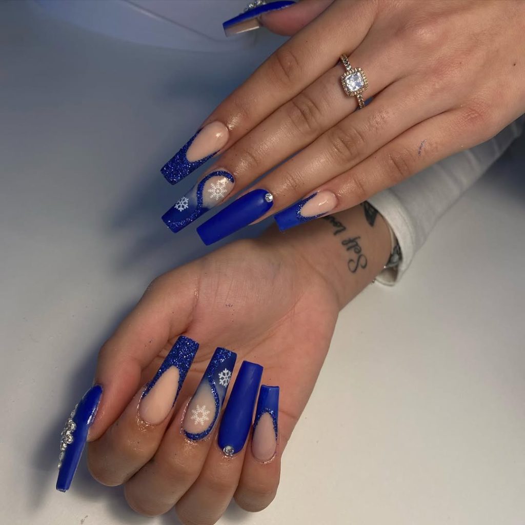 Royal Blue Cutout Nails with Crystal and Snowflakes blue winter nail design