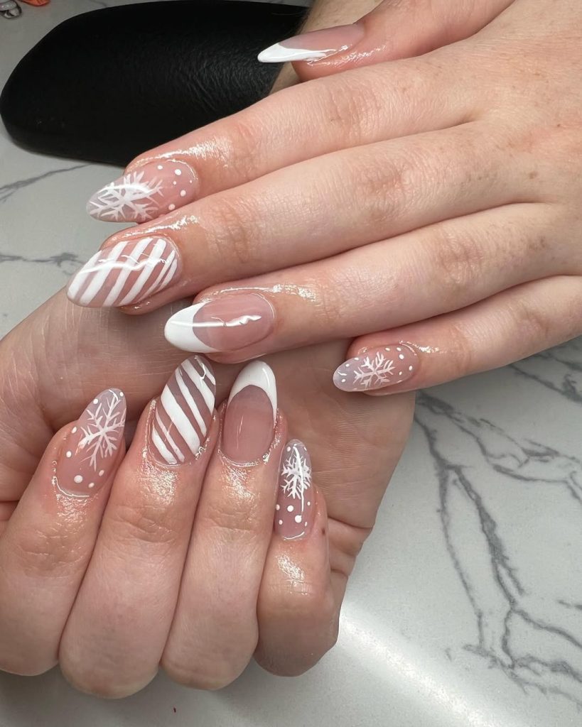 White French Tips with Candy Stripes and Snowflakes subtle Christmas nail design