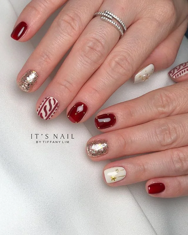 Classic Red with Gold Glitter December nail manicure