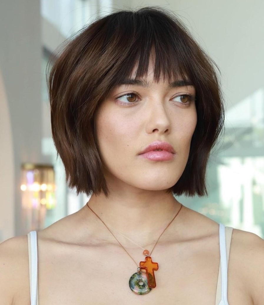 Brunette bob with choppy bangs short hair hairstyle