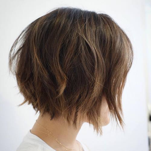 Choppy chin-length bob haircut with jagged ends