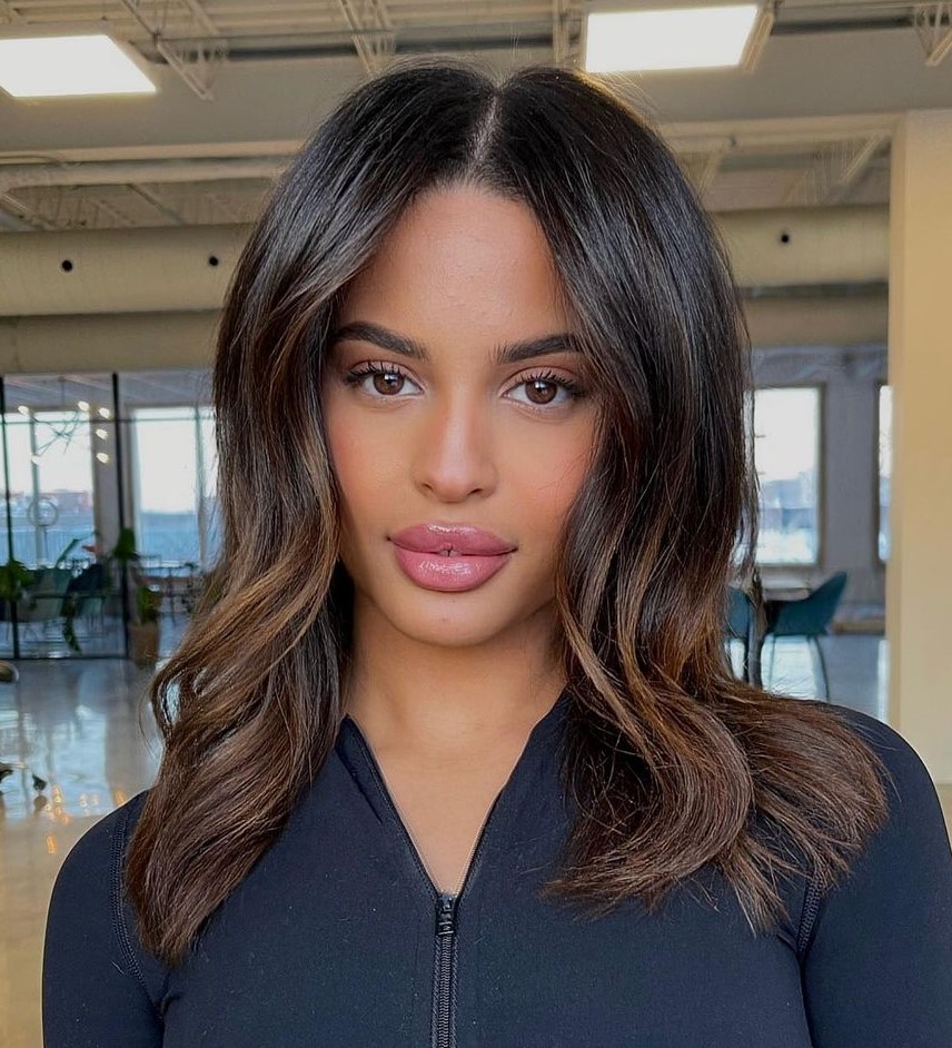 Black hair with partial brown balayage medium hair