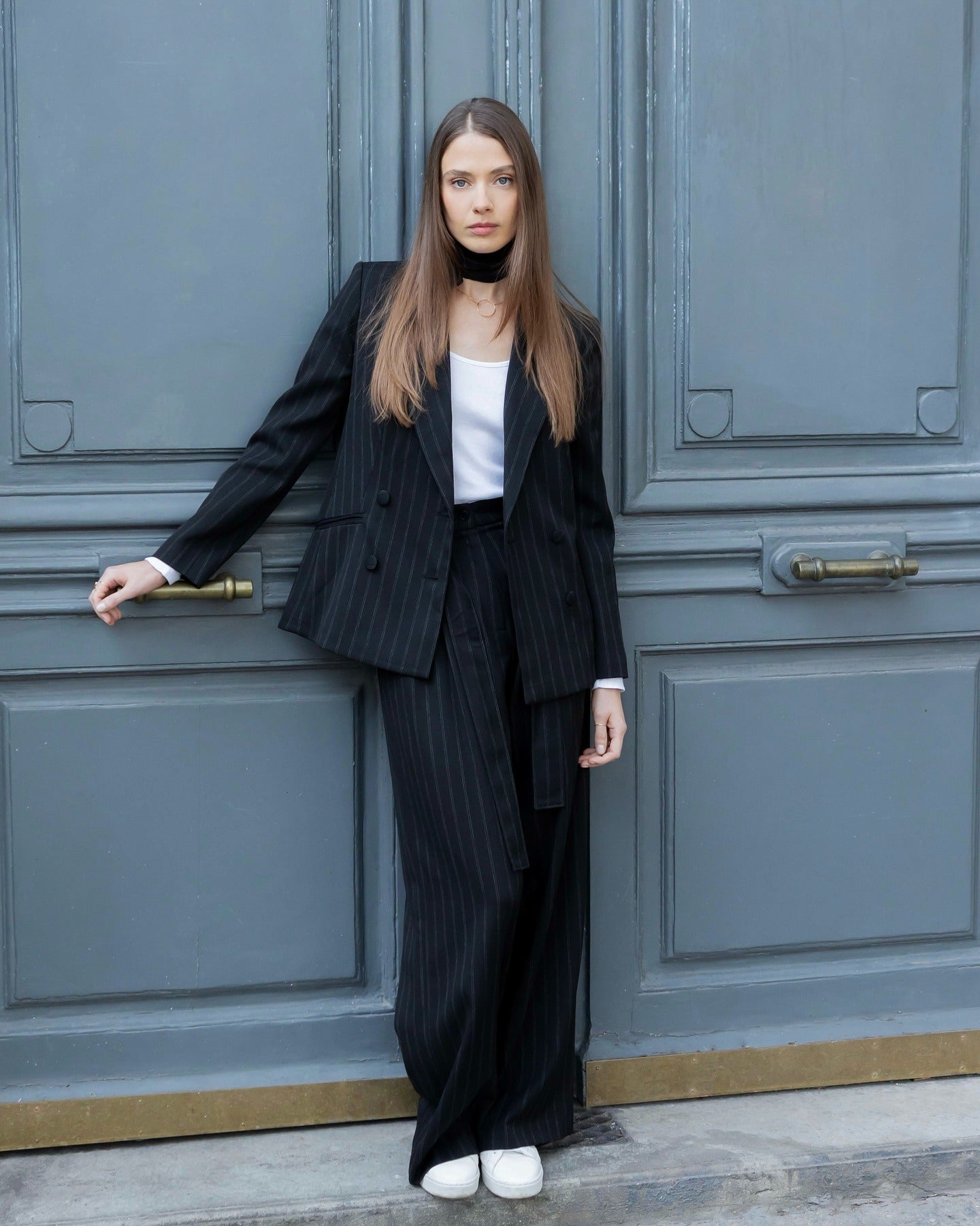 Black pinstripe blazer suit with wide-leg trousers