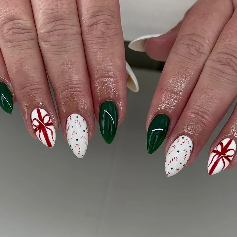 Evergreen with Candy-Red Bows December nail manicure