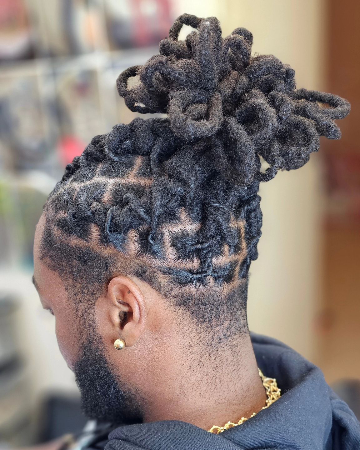 Textured Black Barrel Twist Updo twist updo hairstyle