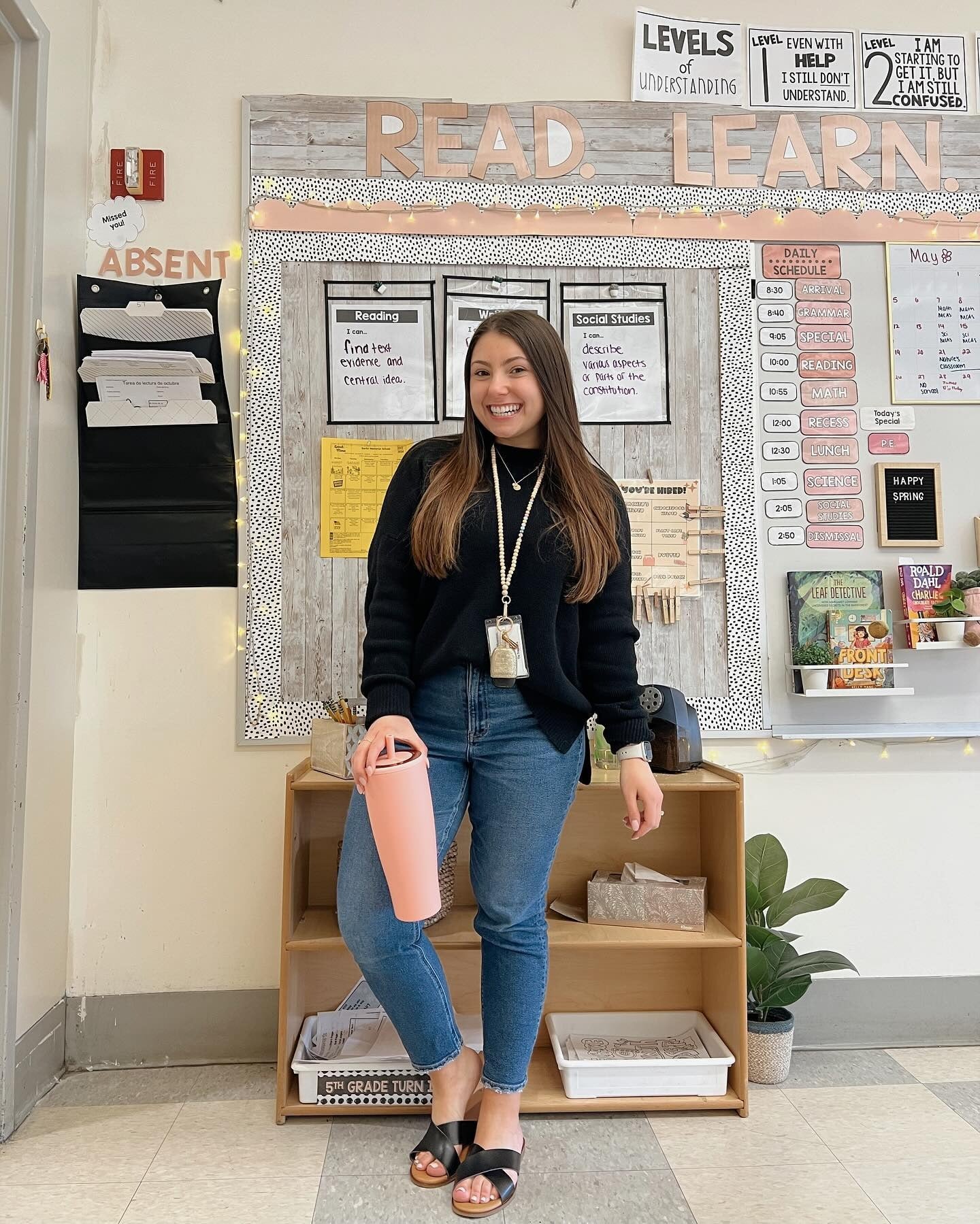 Black Sweater with Classic Blue Denim teacher outfit