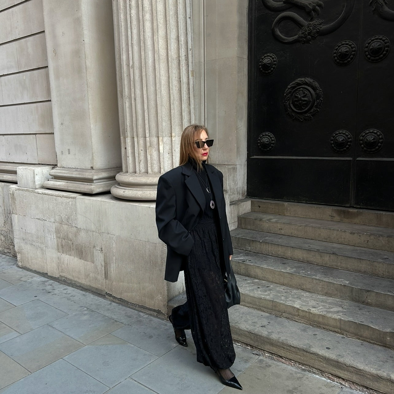 Classic Black Coat with a Feminine Skirt black outfit