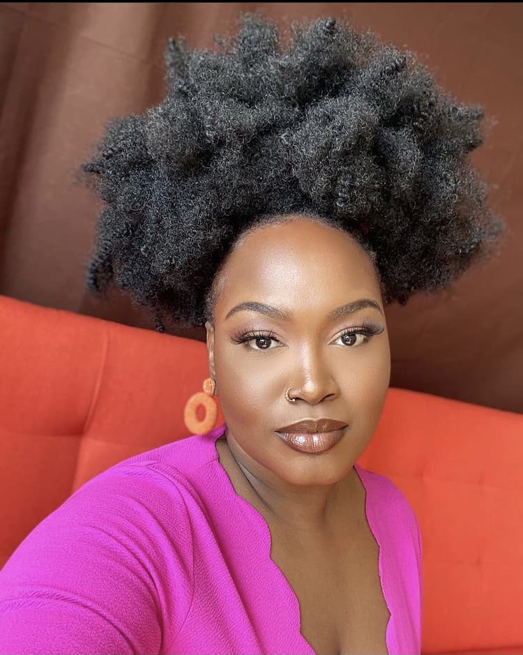 High Afro Puff with a Soft, Rounded Crown 4c hair style