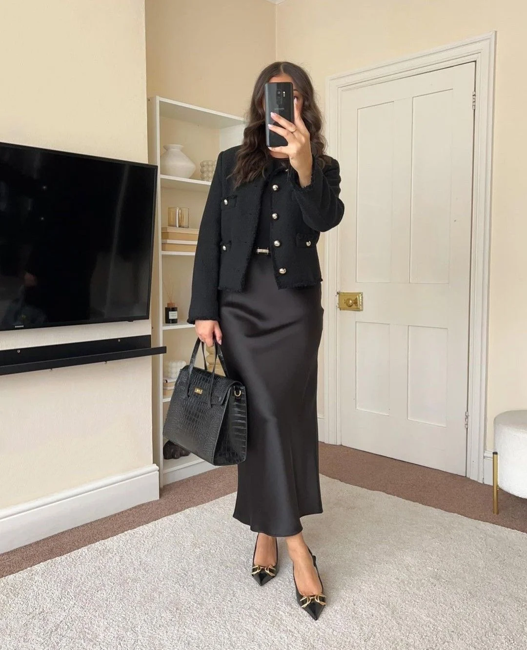 Tweed jacket and pointed heels with black satin skirt outfit