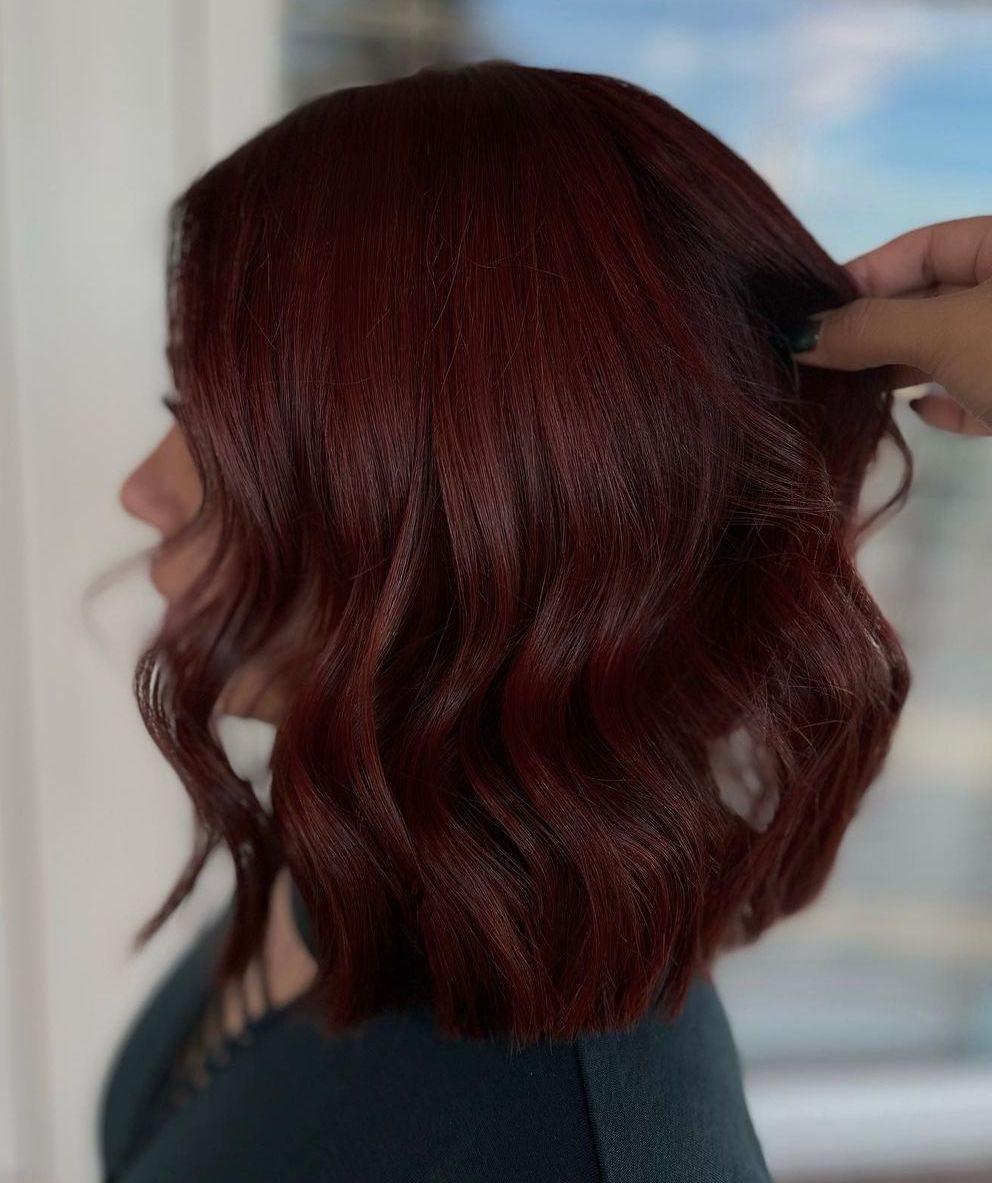 Short Red-Brown Bob with a High Shine red hair color