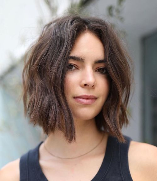 Tousled short bob haircut parted in the middle