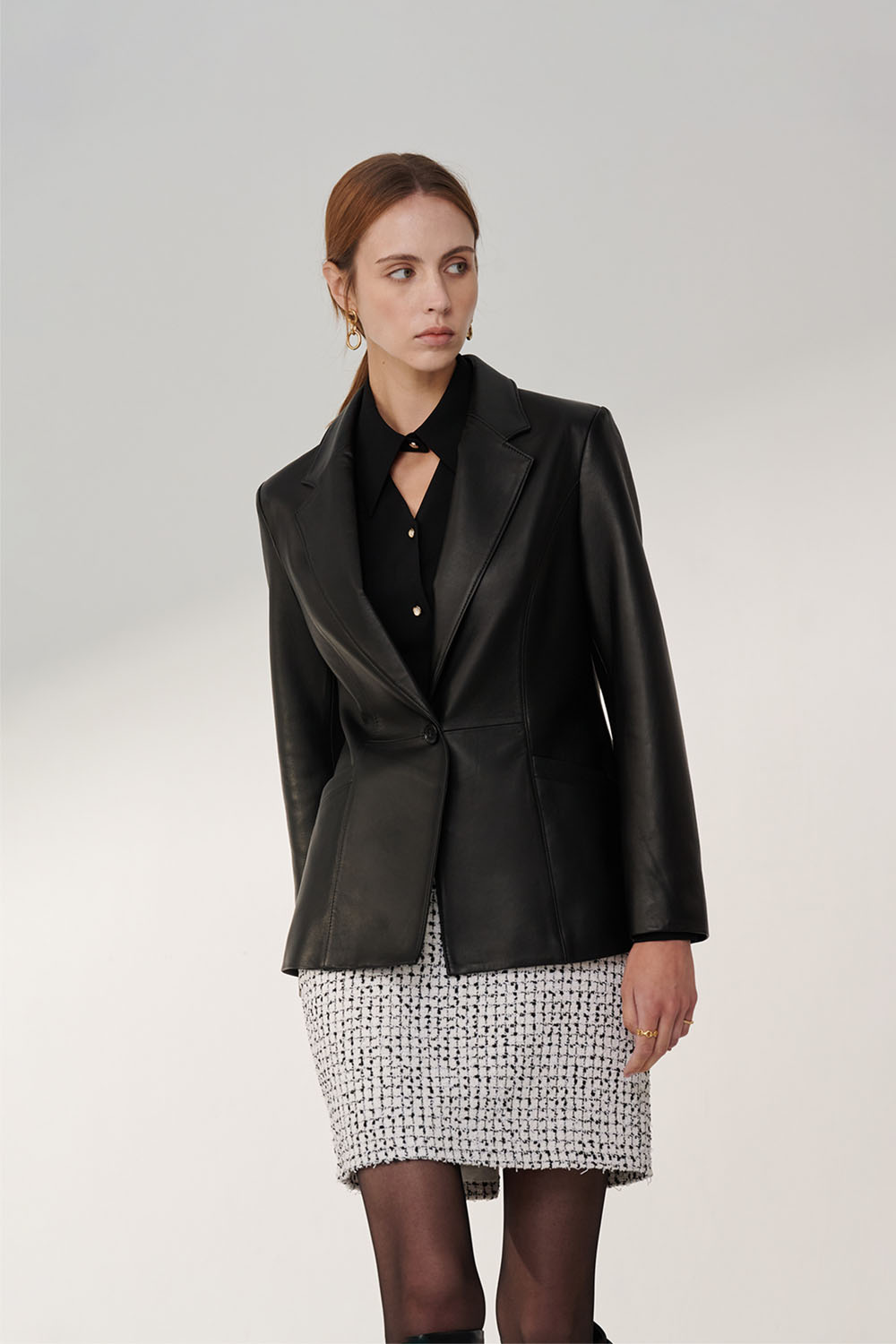 Black Leather Jacket with a Tweed Midi Skirt professional outfit