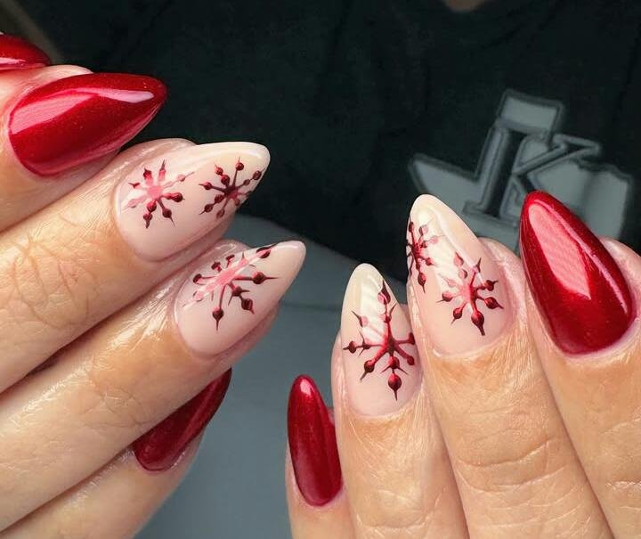 Glossy Red Nails with Red Snowflake Art snowflake nail art design