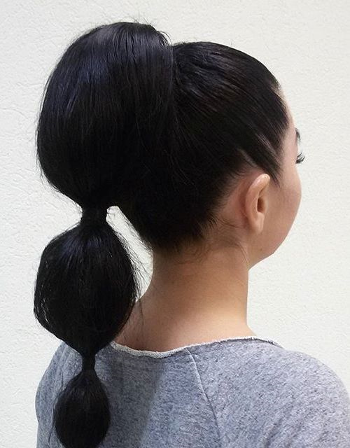 Bubble ponytail on a sleek straight base with banded sections