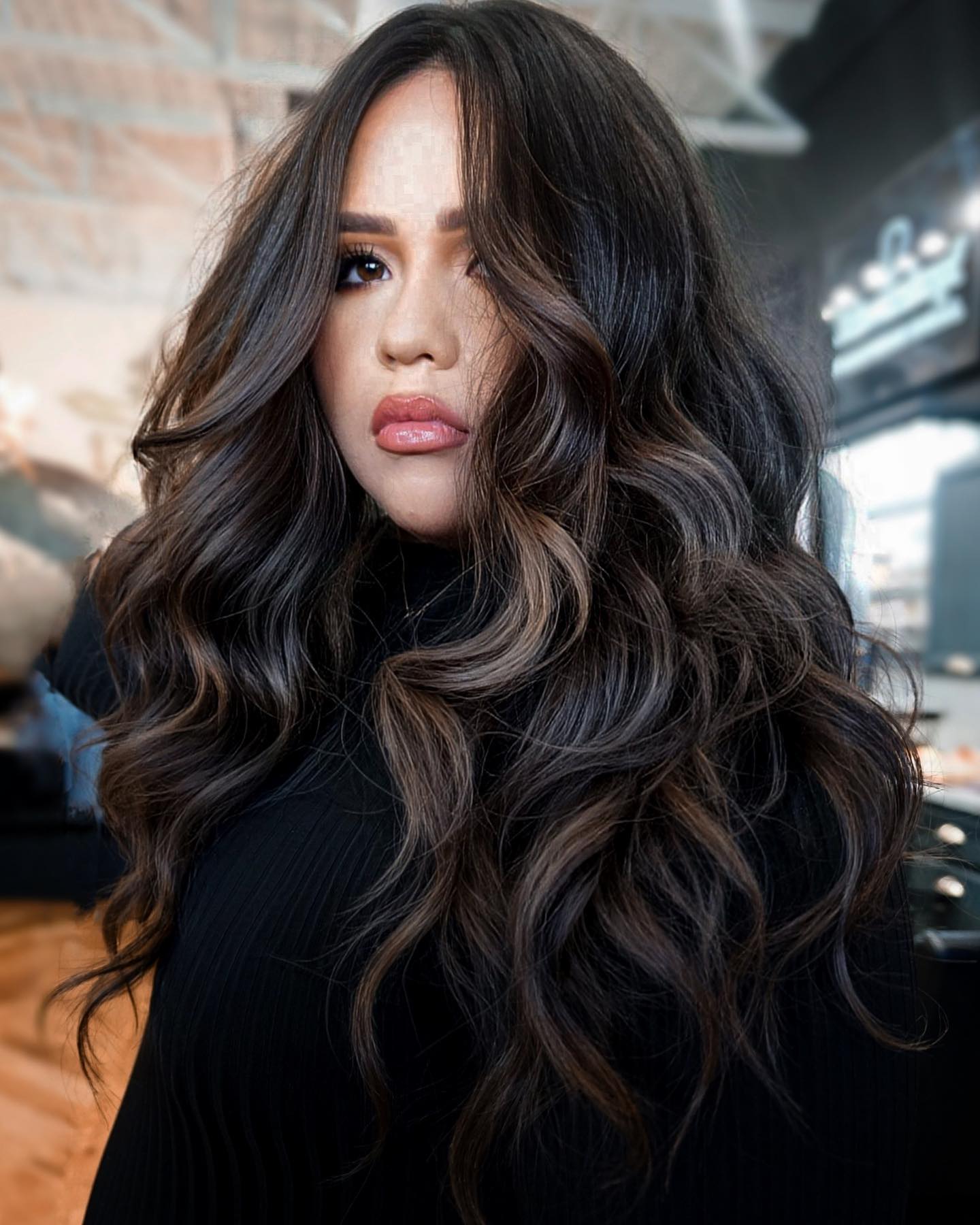 Espresso brown hair with whisper-soft partial highlights