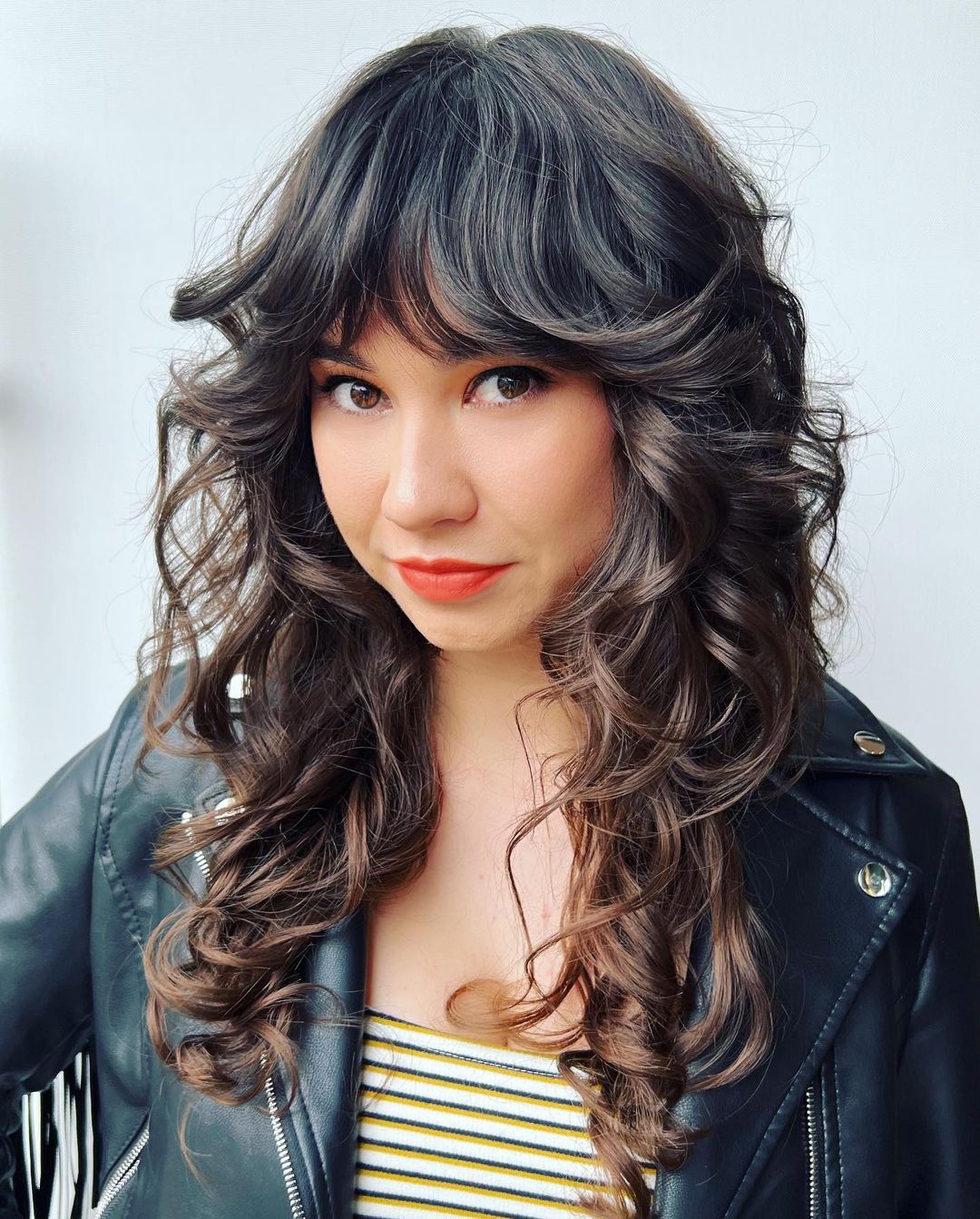 Shag with curtain bangs for wavy hair layered haircut