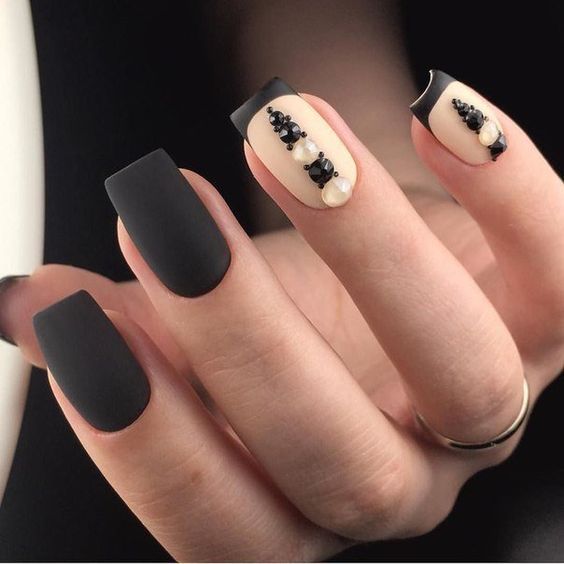 Black Nails with Pearl Embellishments photo