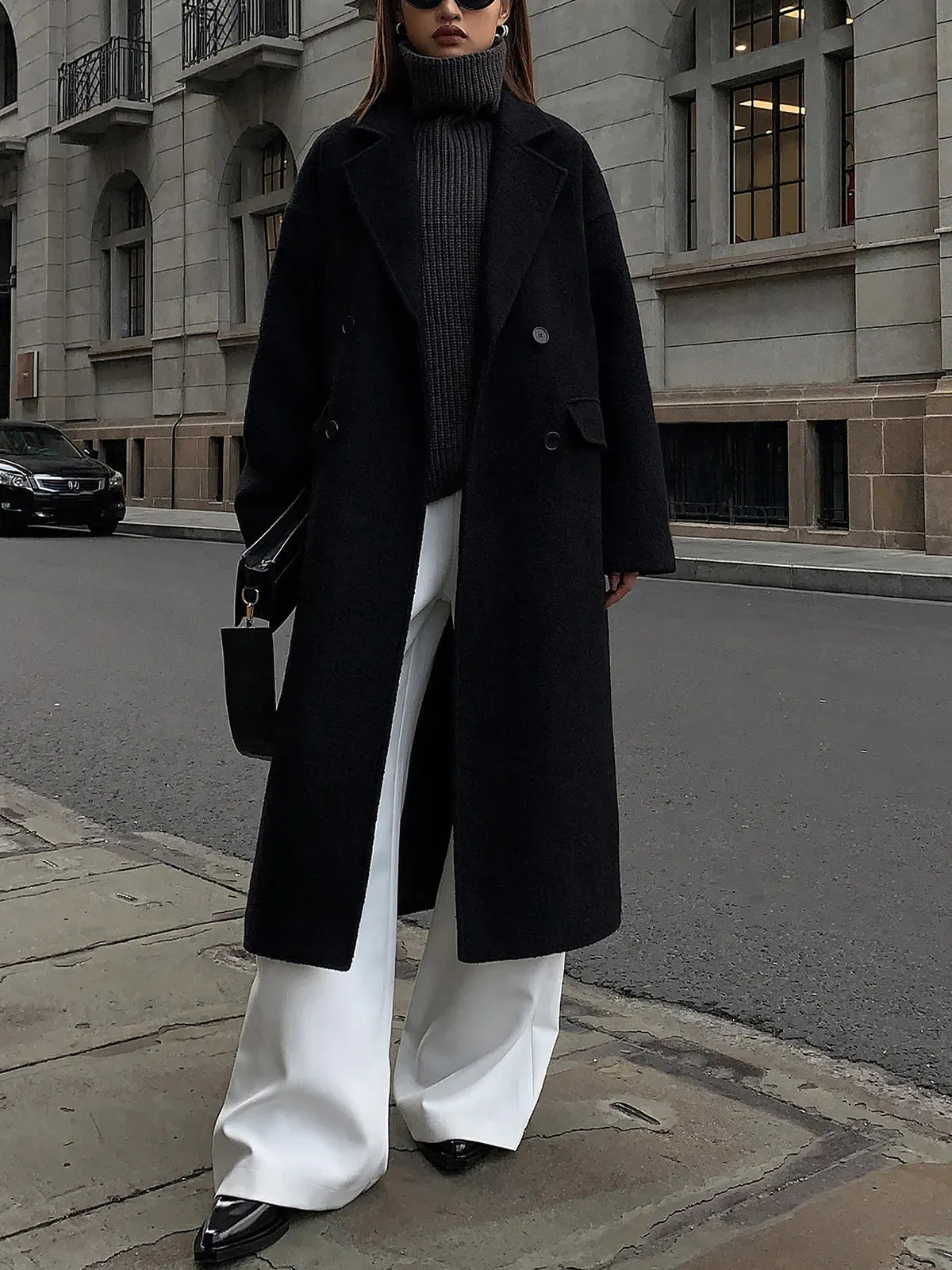 Woman in a floor-length maxi wool coat