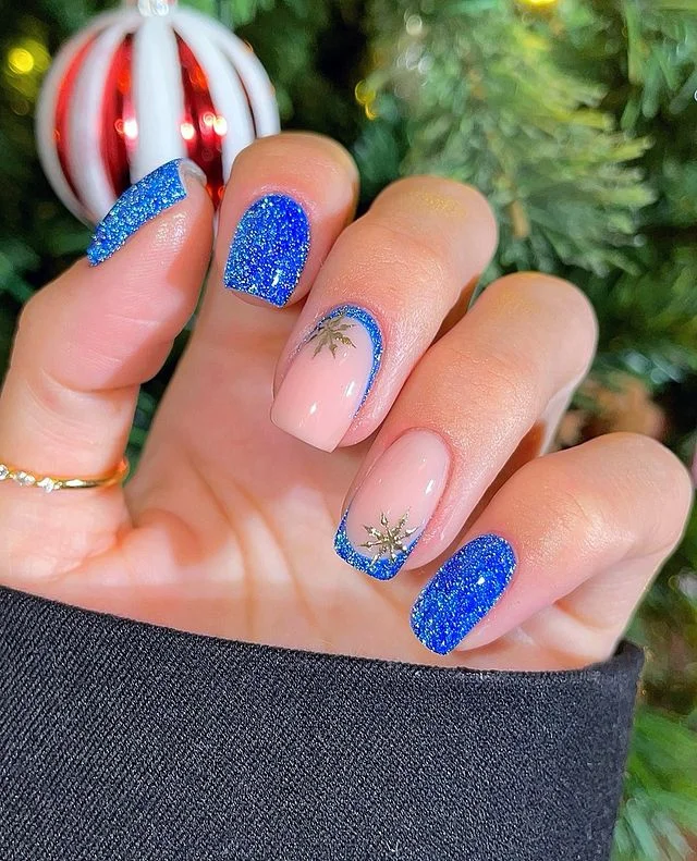 Royal Blue Glitter with Snowflake Detail December nail manicure