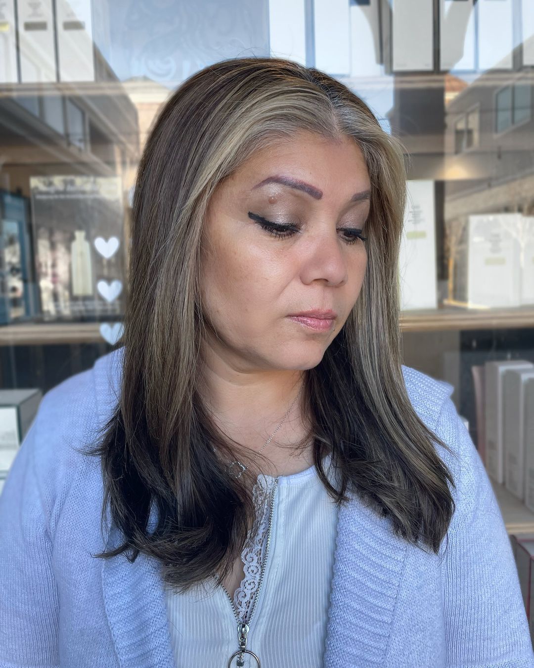 Face-framing gray blend on dark hair