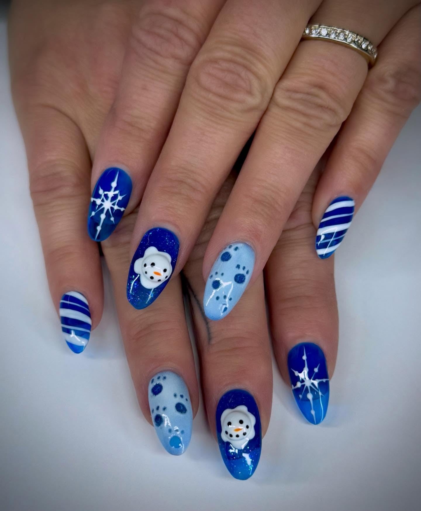 Royal Blue Snow Globe Nails with Snowflakes snow globe nail design