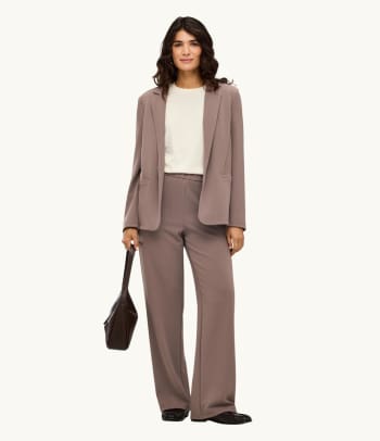 Oversized blazer outfit worn over a dress or crop top
