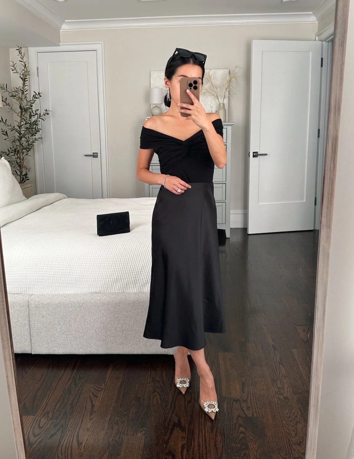 Off-shoulder sweetheart top and jewel heels with midi satin skirt outfit