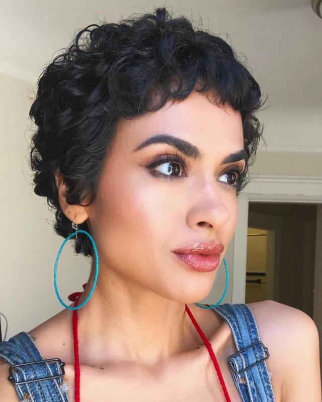 Black curly pixie cut with natural volume