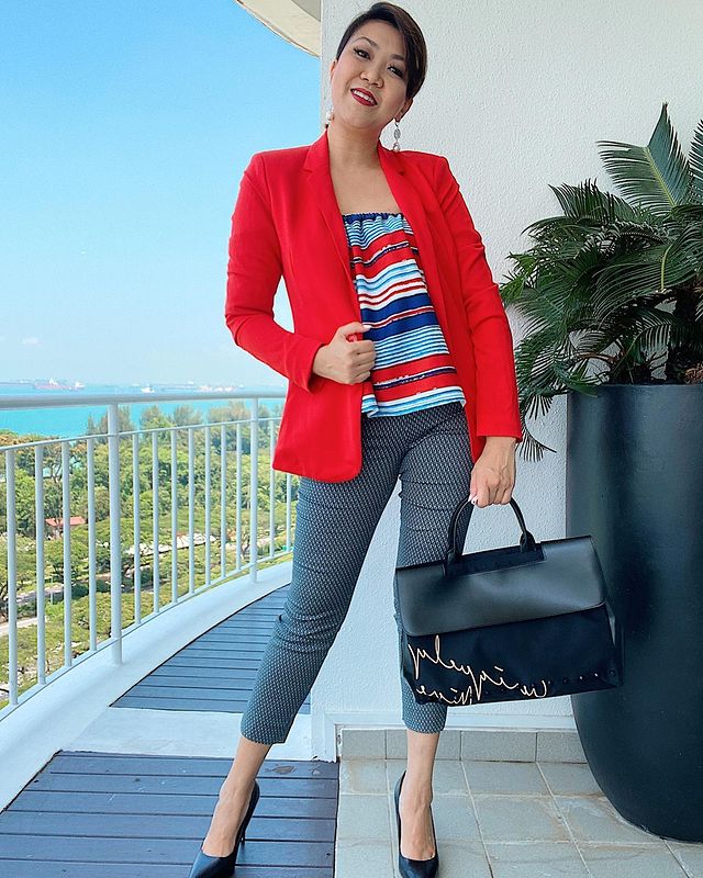 Red blazer with striped top and patterned ankle trousers job interview outfit
