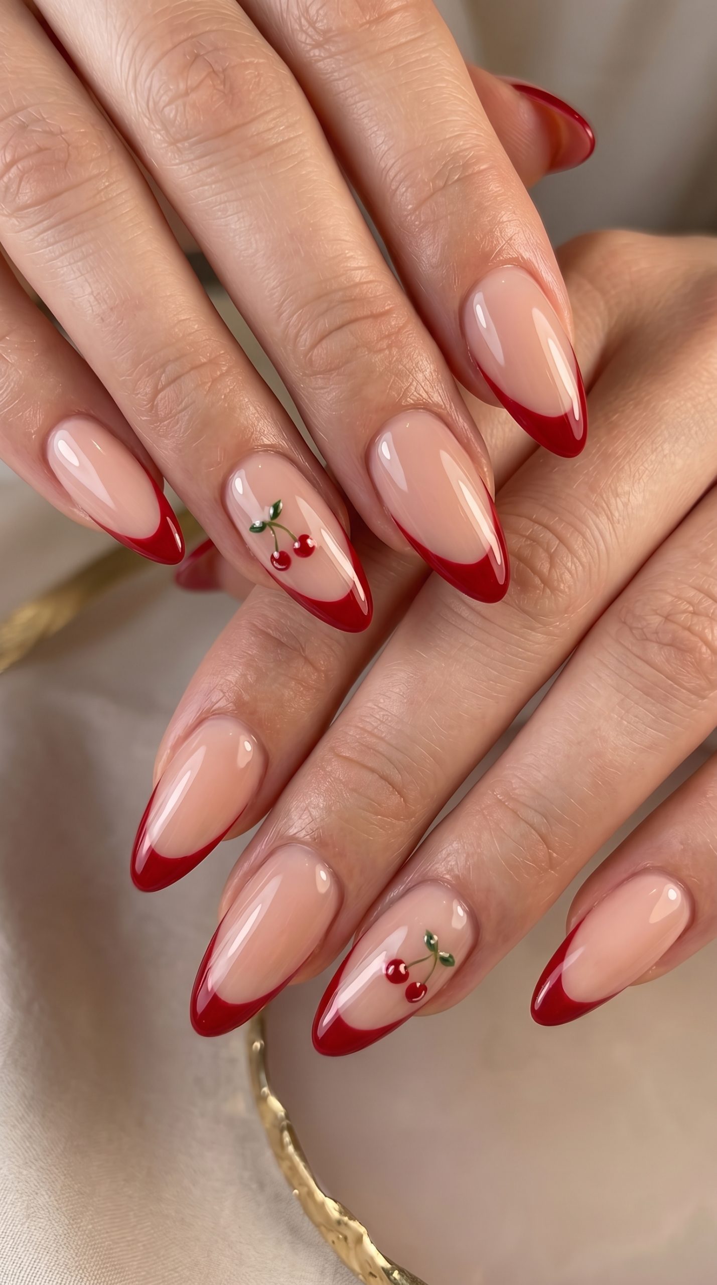 Bold Scarlet Tips Over a Sheer Nude Base red nail design