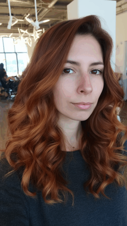 Warm copper balayage waves with auburn to gold depth copper hair color