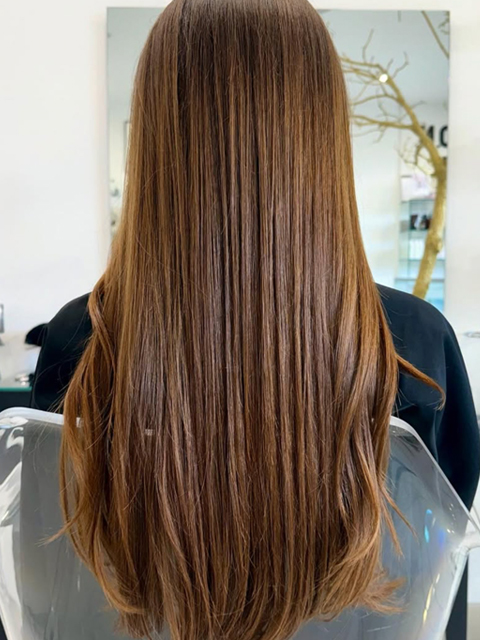Honey-dipped ends on chestnut brown hair