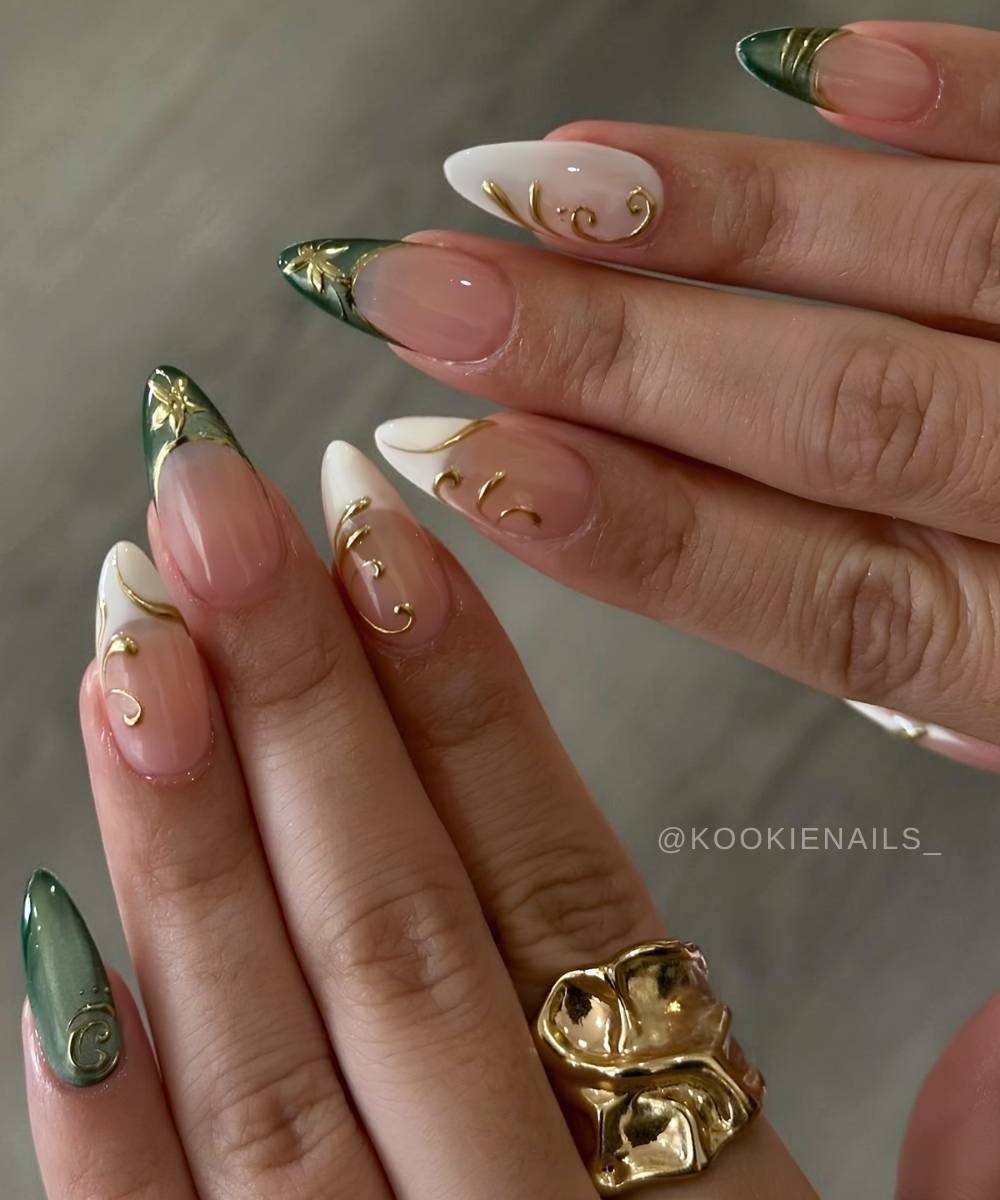 Dark Green Cat-Eye Nails with Gold Accents dark green winter nail design