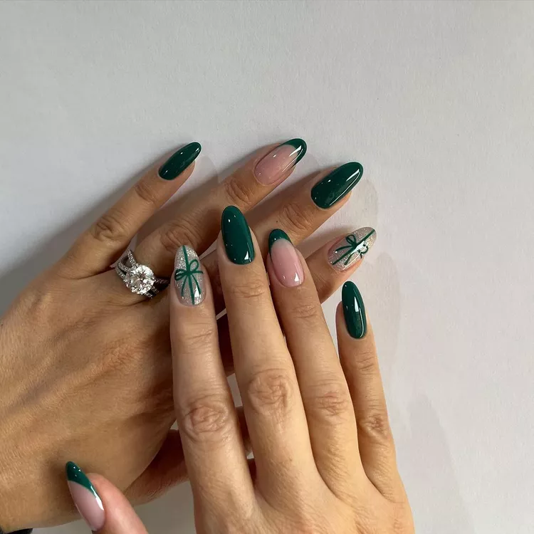 Emerald Nails with Silver Glitter Bows subtle Christmas nail design