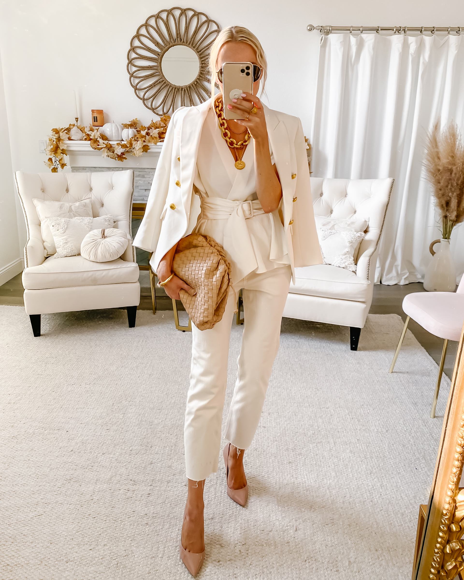 Cream blazer with a silk camisole and tailored trousers