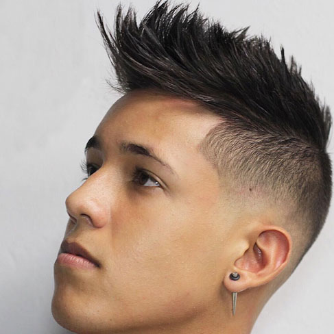 Spiky faux hawk haircut on a man