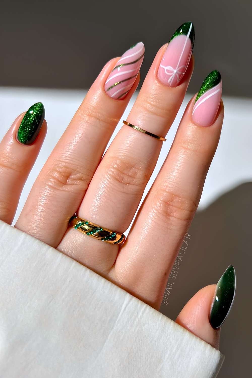 Glitter Green Nails with Candy Swirls and Bows green christmas nail design