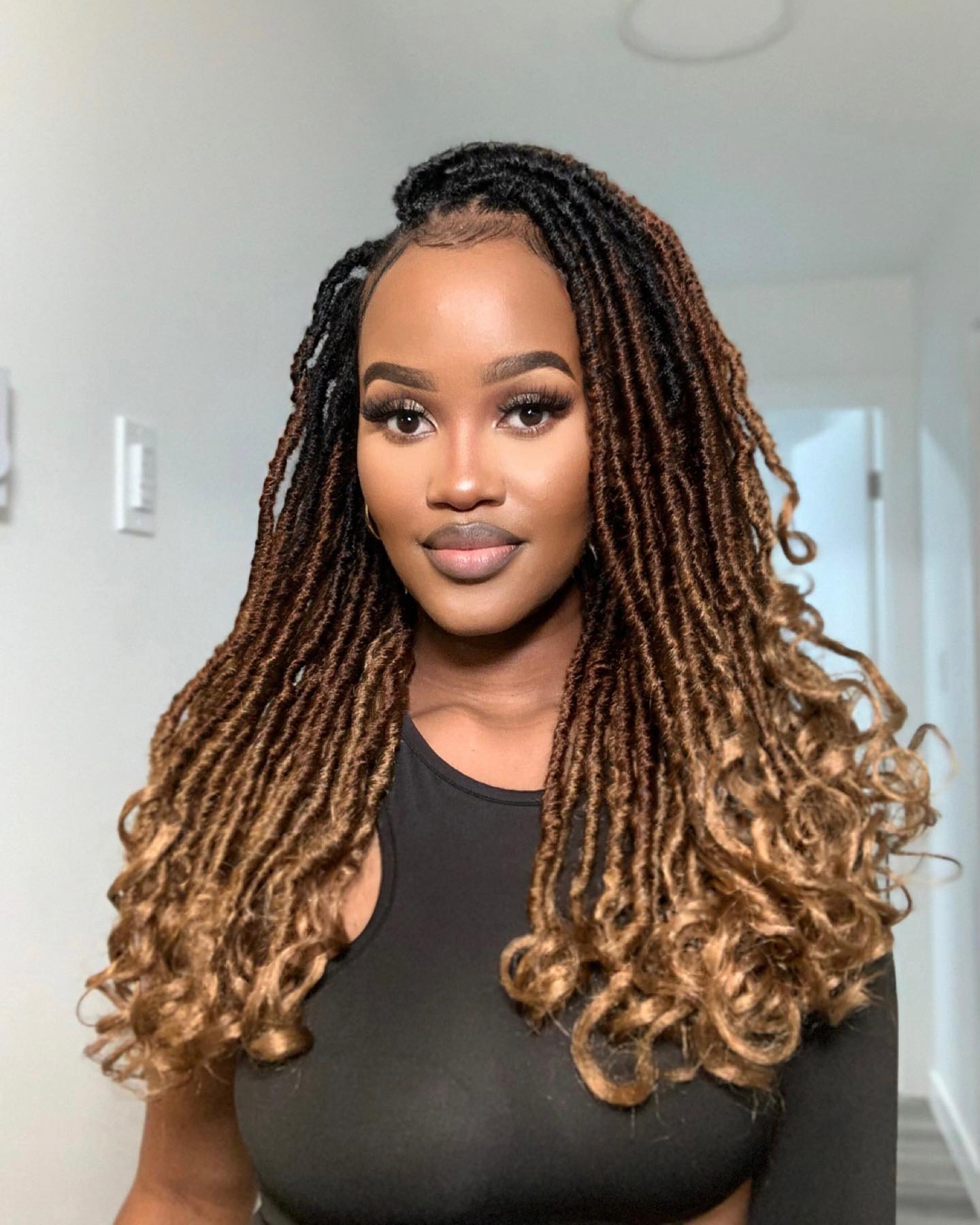 Goddess locs with loose wavy ends