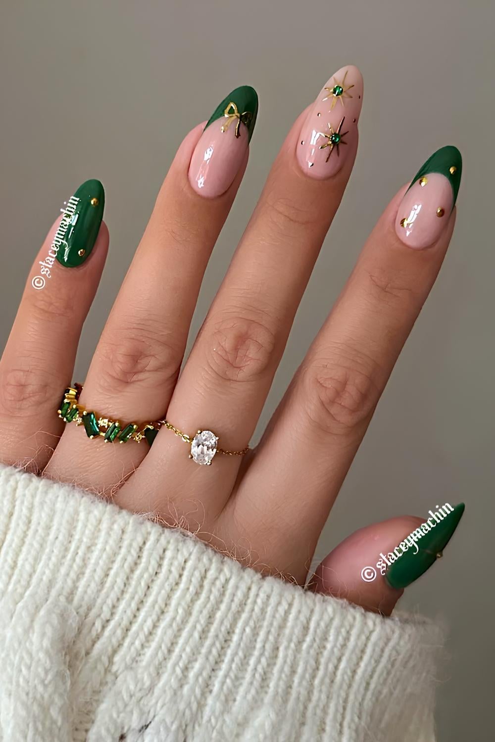 Golden Bows on Deep Green Almond Nails green christmas nail design