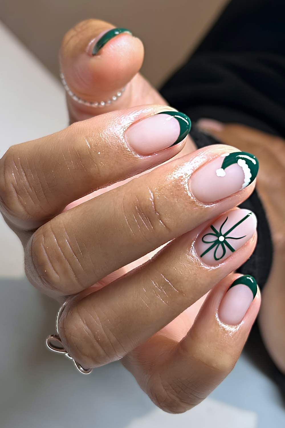 Green French Tips with Santa Hat Details green christmas nail design