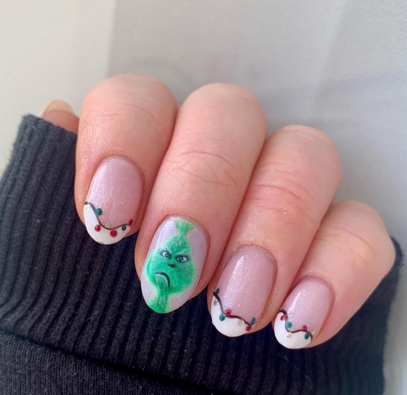 Whimsical Grinch French Tip Nails grinch nail design