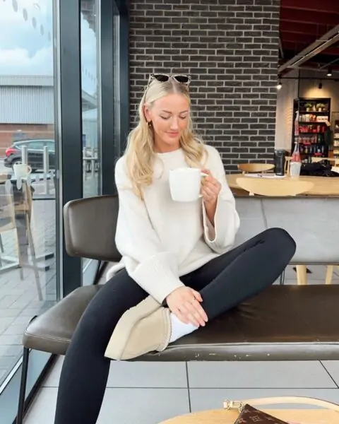Oversized cream fuzzy sweater with black leggings