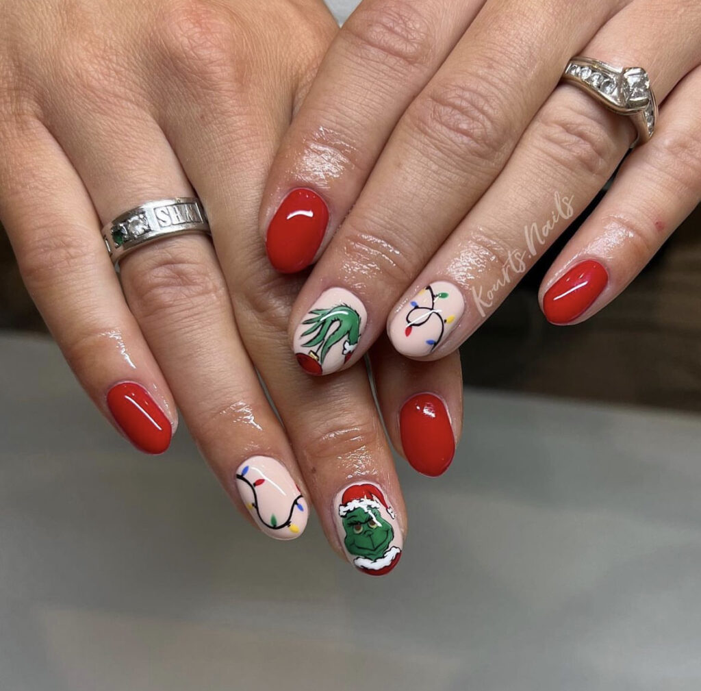 Short Grinch Nails That Still Steal the Show grinch christmas nail design