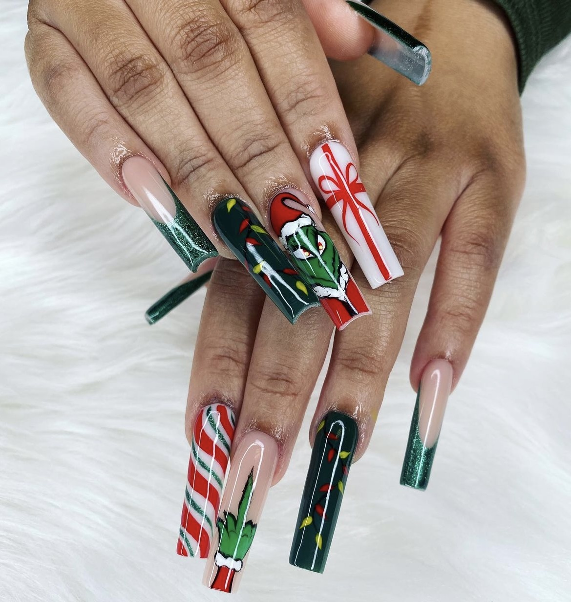 Grinch Christmas Character Stiletto Nails grinch nail design